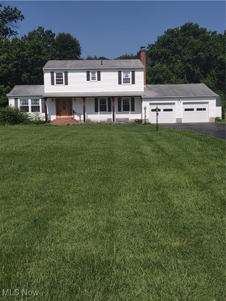 Beautiful, spacious country home set on 2+ quiet acres. This 4-bedroom, 4-bath home is perfect for families. Highlights include an eat-in kitchen with slate floor and pantry; large living room and dining area; cozy family room/den with fireplace and built-in shelving; private, screened back porch; and large 23 x 15 bonus room/office. All appliances stay. Walk-out, full basement leads to a beautiful yard with a large shed.  This property is sure not to last. Must see!