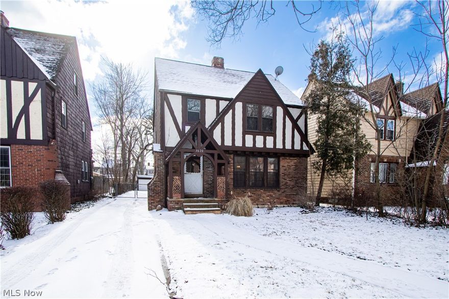Just move in and enjoy this beautiful, newly remodeled 4 bedroom, 1.5 bath Tudor style home in Cleveland Heights. It’s the perfect mix of updates and original charm! Stunning hardwood floors flow through almost every room. Gorgeous fireplace in the living room. The dining room features a lovely built in cabinet and access to the 2 story covered rear patio (2nd floor deck accessible from upstairs bedroom). Updates include: new paint throughout, new kitchen flooring, forced air serviced and upgraded HVAC, upgraded main electrical circuit breakers. The 418 Sq ft third floor bedroom (22ft X 19ft) is heated and air conditioned and features new paint, new carpet, new windows, newly carpeted stairs, cozy sitting bench and cedar closet. All 3 bedrooms on the 2nd floor feature ceiling fans. Stove, refrigerator, new dishwasher, washer and dryer are ALL included! Finished lower level rec room. Gated rear yard and 2 car detached garage with new metal roof, new vinyl siding and white doors with ele