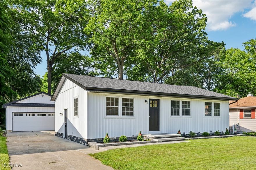Don’t miss the opportunity to own this beautifully remodeled ranch nestled in a serene neighborhood in Munroe Falls. Every detail has been meticulously updated, including a spacious new two-car garage. The interior boasts a fresh and clean aesthetic, featuring a kitchen equipped with brand new stainless steel appliances, a dishwasher, and elegant granite countertops. The sunroom, with its vaulted ceilings and abundant natural light, is truly a standout feature. A sliding glass door opens to a back deck that overlooks a spacious backyard. The newly finished basement showcases plush carpeting throughout, a full bathroom with a double vanity, and an additional storage room, making it an ideal hangout space or canvas for your creativity. This lovely home is conveniently located near various parks, shopping venues, and dining options.