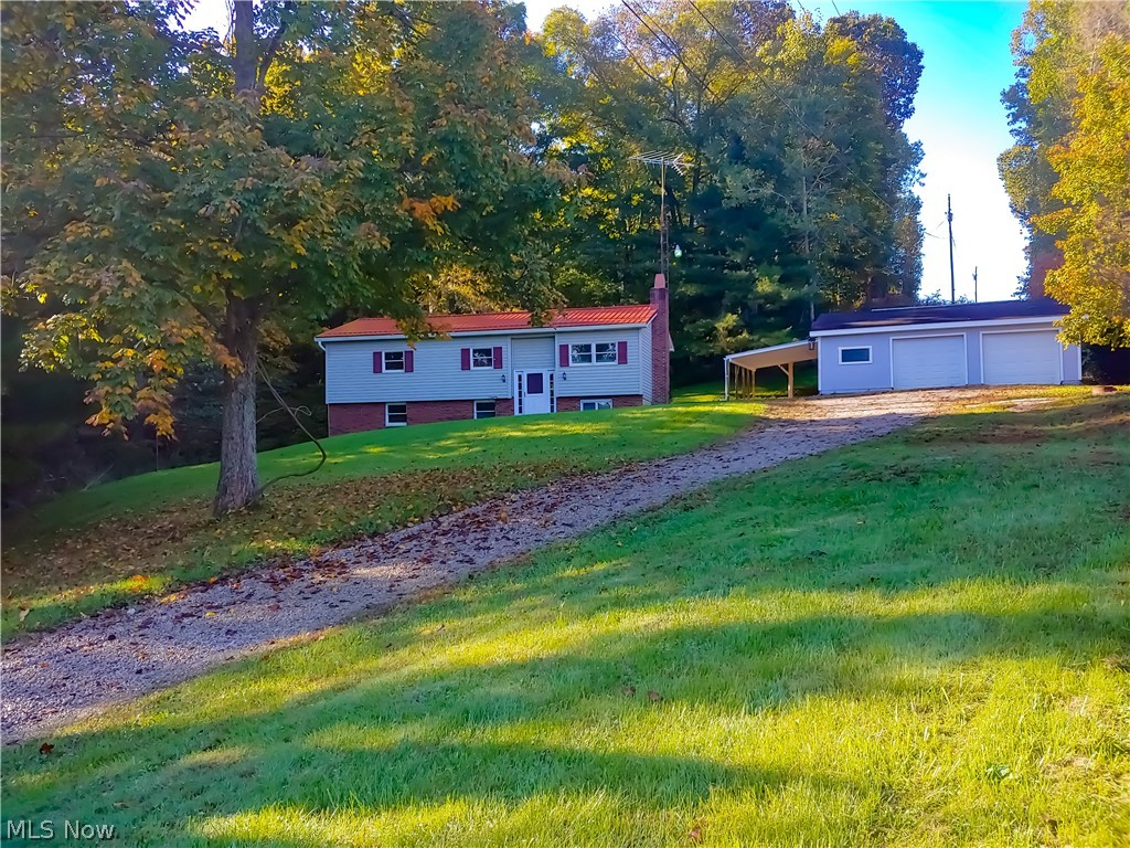 Beautiful home located in a serene county setting within East Muskingum School District. This home includes 3 bedrooms, 2 full bathrooms and possesses a open kitchen floor plan. There are sliding glass doors located off of the kitchen that lead to a private patio-perfect for entertaining. The basement is partially finished with a wood burner. This property comes with over 10 acres which includes a 2 car detached garage and 2 barns with electric and water. This home uses Geothermal heat. With so much to offer- this home is a must see! You will not be disappointed.