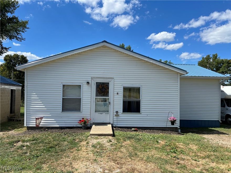 Welcome home to this ranch style 3 bedroom home situated on just shy of an acre! Formal dining room with pass through window to the kitchen. Kitchen offers plenty of cabinet space with new hardware and space for an island or extra dining table. Spacious living room and convenient main floor laundry. Interior home has been freshly painted. This home is within minutes of Salt Fork Lake. Back yard has plenty of usable space for entertaining, outdoors activities, cookouts, cornhole, etc. You do not want to miss this opportunity! Call for a private showing today!