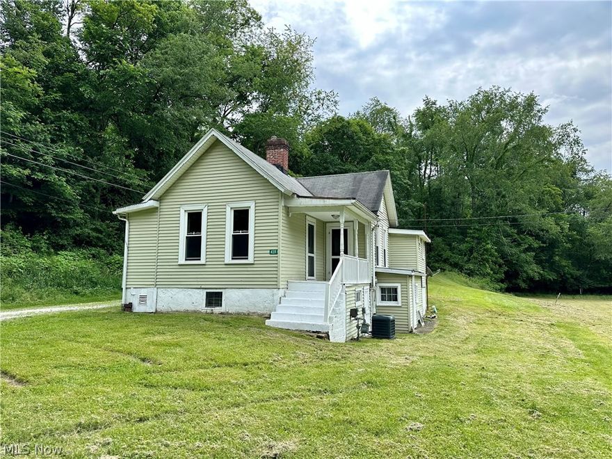 Charming country cottage on a sprawling lot in Hopedale. This home welcomes you to a covered front porch overlooking the large front yard. From there you are taken into the warm living room with high ceilings. you are then taken to a large eat in kitchen with cabinets to the ceiling. The home features 2 massive bedrooms on featuring a walk in closet. The upstairs also features a full bath. Outside you will find a 1 car garage.