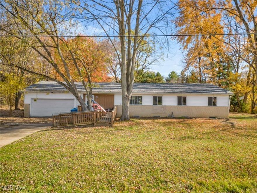 Beautiful ranch home nestled in a quiet, sought-after neighborhood in the Copley Fairlawn city school district. This fully handicap-accessible residence welcomes you with a spacious entryway that opens into a bright living room, dining area, and kitchen. A convenient bonus room off the kitchen includes laundry and extra storage, allowing for true first-floor living. The primary suite offers a large wheelchair-accessible shower and plenty of space for comfort and ease of use. Two additional bedrooms and a full bath are also located on the main level. Recent updates include fresh interior paint throughout, a brand-new air conditioner (2024), a furnace installed in 2014, and a new roof, siding, and back gutters (all completed in 2024). This home is perfectly positioned on a beautiful corner lot of just over half an acre — offering both privacy and curb appeal.