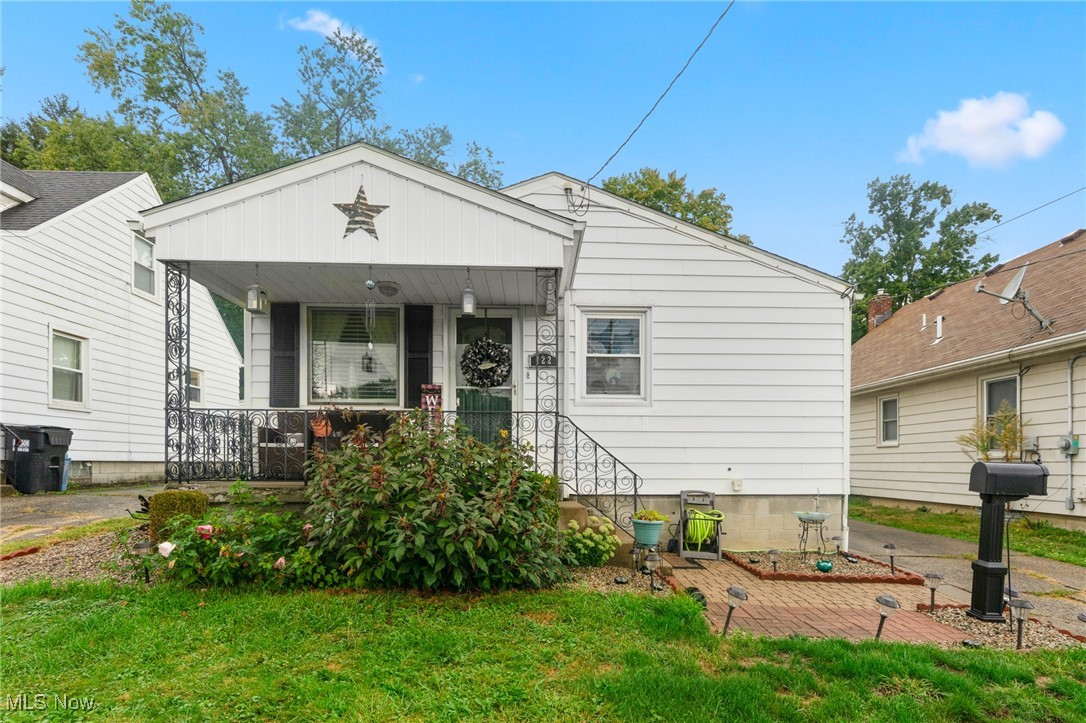 "Small but mighty" this charming bungalow is a must-see! Perfect for first-time buyers or those seeking a cozy forever home, it checks all the right boxes. The open-concept kitchen and living room boast a stunning feature wall that's sure to impress. All appliances, including the washer and dryer, are included in the sale. Just down the hall are three spacious bedrooms featuring hardwood floors, and full bathroom with tub and shower. The hallway offers ample storage with two closets for linens and household essentials, while the primary bedroom features a large double closet. The lower level rec room is a game-changer! With a custom bar area, vinyl flooring, a 2nd modern full bath, laundry room, and two generous storage closets, the perfect area for spending time with friends and family. Plus, enjoy the peace of mind that comes with a lifetime warranty for the basement waterproofing that's fully transferable. Additional features include updated windows, a sump pump, and stylish 6-panel doors. Don't miss out – schedule a viewing before someone else snaps it up!"