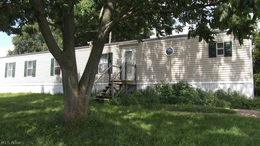 Enjoy a country setting?  This 2002 16x80 Skyline Ridgewood Mobile Home is located on a country lot. Lot rent is $200/mo and includes water/sewer.  Mobile home can be moved.  Immediate possession.