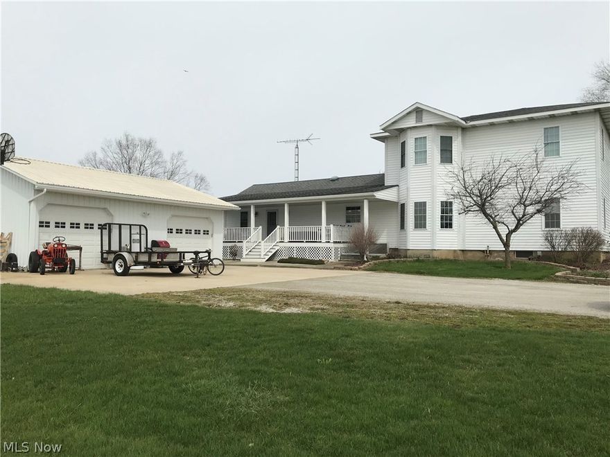 Beautiful 2 story, 4 bedroom, 2 bath home on 7 acres.  2500 sq ft home that has updated kitchen & baths, large covered porch w/trex flooring, 7 year old roof, septic new in 2015, updated plumbing & wiring, central air, 1st floor laundry & updated windows (windows need trim put back up).  There is also a 26'x32' detached 2 car garage with a 16' lean to plus a storage shed.  Come take a look for yourself.