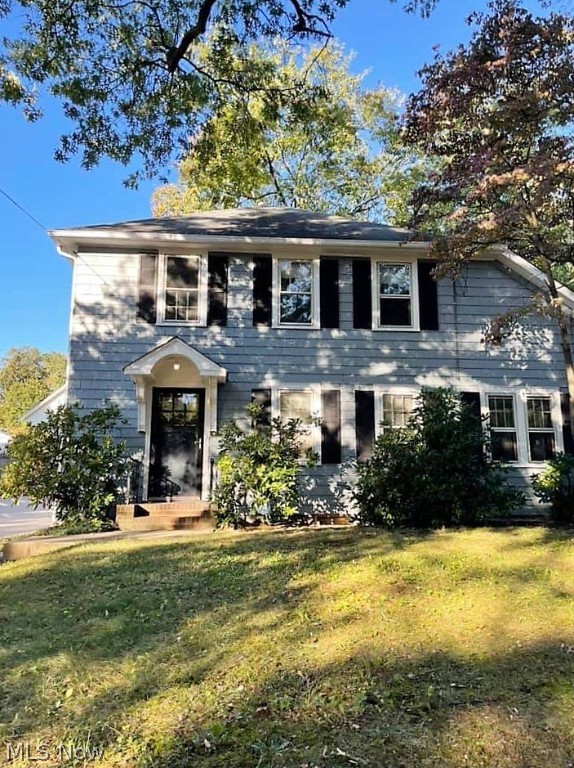 Welcome home to this charming colonial home in Kent! Come on into the large living room with mantle, built in cabinet, wood flooring, and dining room, and kitchen. There are three large bedrooms with newer carpet and a large full bathroom upstairs. The lower level is unfinished, new glass block windows, plenty of room for storage, laundry area, workout area etc. There is a one car detached garage. Sit out in the backyard and just relax! Close to the University, shopping, restaurants, highway. Ready to move right in!