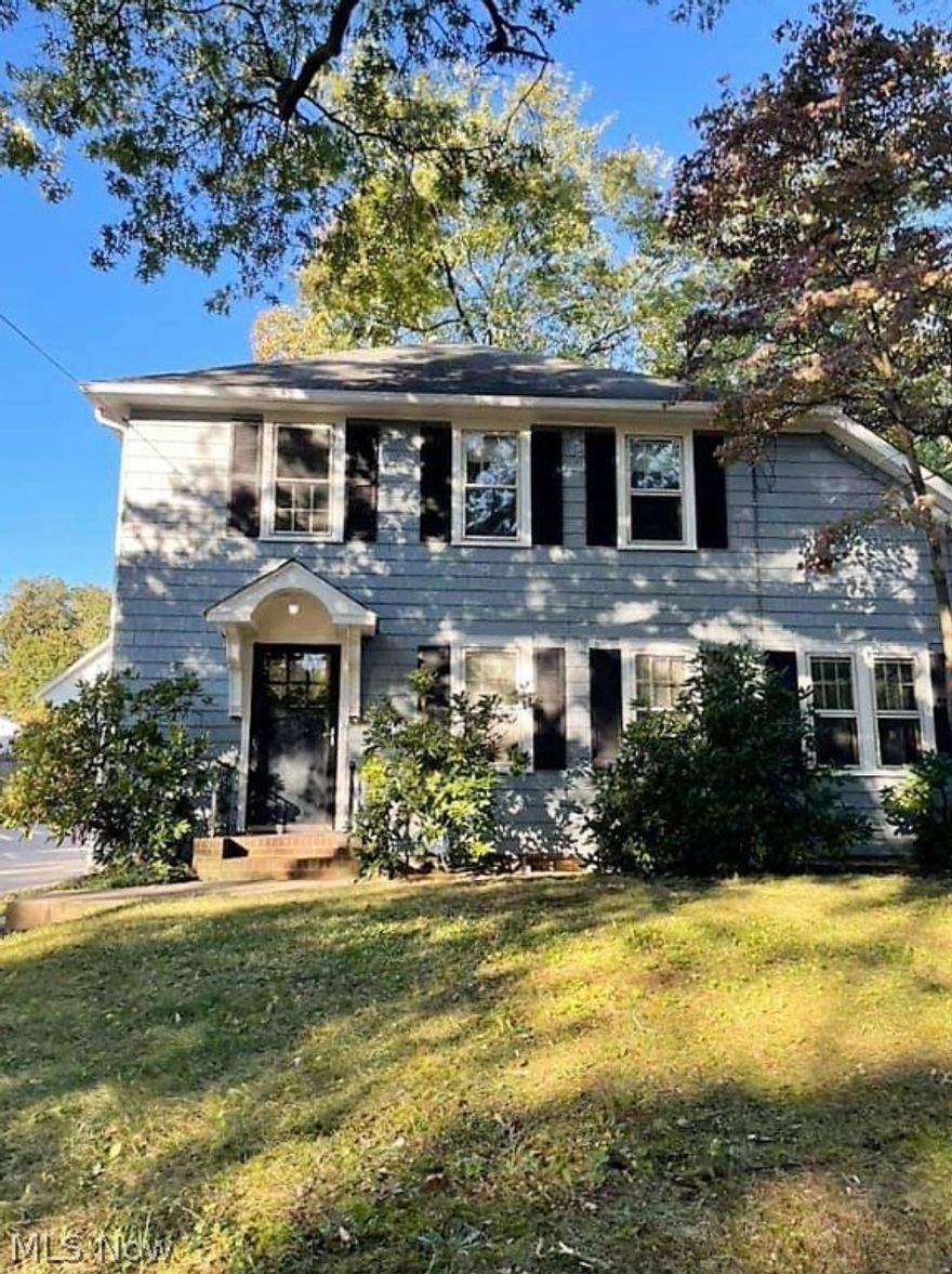 Welcome home to this charming colonial home in Kent!  Come on into the large living room with mantle, built in cabinet, wood flooring, and dining room, and kitchen. There are three large bedrooms with newer carpet and a large full bathroom upstairs. The lower level is unfinished, new glass block windows, plenty of room for storage, laundry area, workout area etc. There is a one car detached garage. Sit out in the backyard and just relax! Close to the University, shopping, restaurants, highway. Ready to move right in!