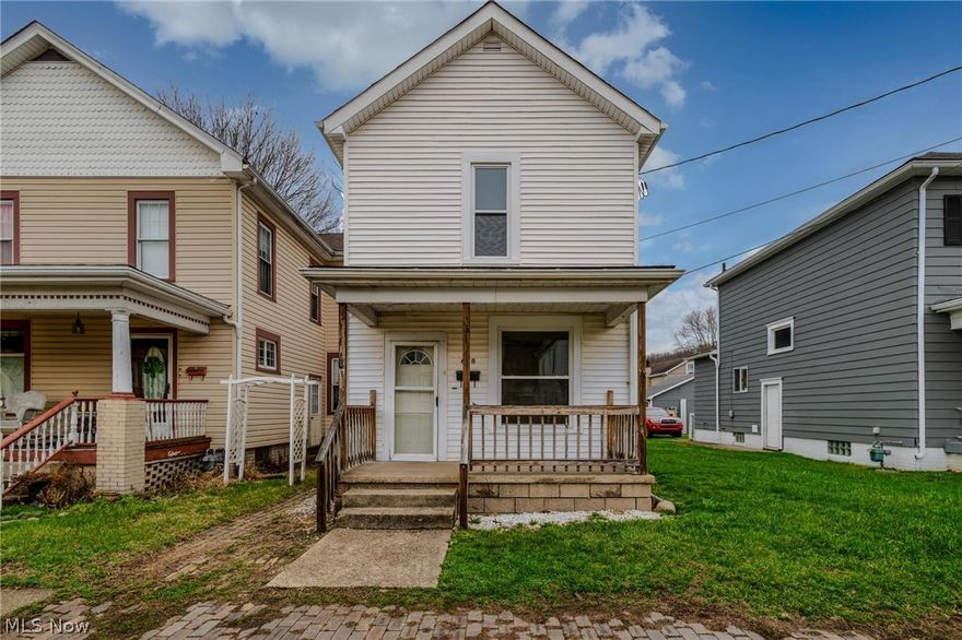 OPEN HOUSE PRIOR TO ANY PRIVATE SHOWINGS -3.14.26 10A-12PM.  STOP RENTING AND START INVESTING!  This home could be yours for a monthly mortgage of approx. $611 w/ some zero down loan programs!  (Call your favorite agent). Welcome home to this inviting 2-bedroom residence featuring a spacious eat-in kitchen perfect for casual dining and gatherings. The living area showcases a gorgeous decorative fireplace that adds warmth and character to the space. Step outside to enjoy the covered patio, ideal for relaxing, entertaining, or enjoying the outdoors in any season. This cozy home offers comfort, charm, and great spaces to make your own. Conveniently located right in the heart of downtown Toronto where ample amenities are close by.