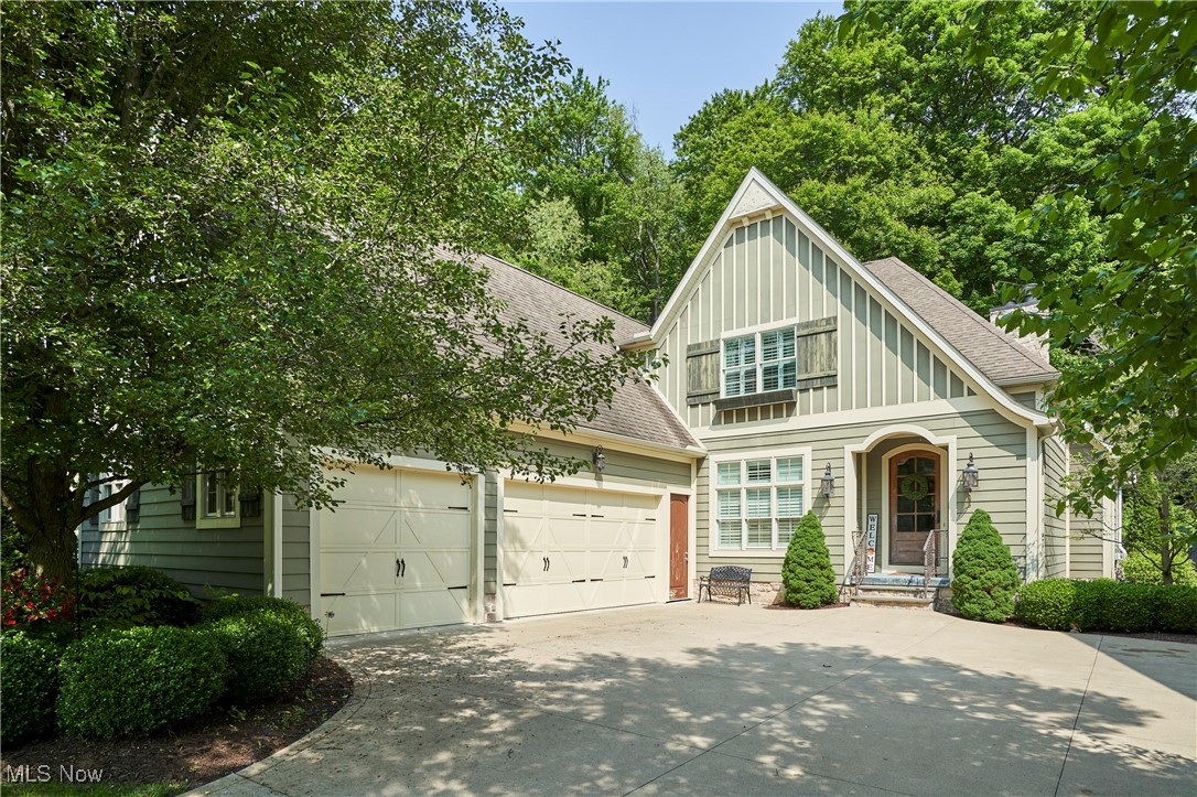 Welcome to Reserve at Waterford, a gated & maintenance-free community in Bath Twp. On one of the most private lots in this community, this home features magnificent craftsmanship throughout including herringbone wood floors, 12ft beamed ceilings, custom built-ins, arched doorways & raised paneling. Beamed great room with wood burning FP opens to gourmet kitchen with stainless appliances, Jenn-Air 6-burner range 10ft granite island & custom cabinets. A large butler's pantry with 2nd sink & dishwasher, beverage center & walk-in pantry is tucked behind kitchen. There is a formal DR overlooking the wooded rear yard. Oversized french doors lead to screened porch w/magnificent stone FP. A study off the foyer is accented with antique doors, hardwood flooring, large picture window, custom bookcases. Attached to a full bath, this could be optional 4th BR. The 1st floor master suite includes tray ceiling, lovely chandelier & elegant & spacious BA leading to huge walk-in closet. A large mud room w tiled floor ,a area with desk is located between kitchen & garage. Upstairs are 2 BR, each with its own vanity area w/shared tub & commode area. Off the upstairs hallway there is a built in desk, oversized closets & a stackable unit laundry. The private, fenced backyard off the screened porch offers large blue stone patio, stacked stone wall, lush landscaping, fenced rear yard. The home features newly finished basement with a half bath , second laundry area, sitting room, another bedroom & large unfinished storage area, 2 laundry rooms, mudroom, & 3-car garage. First floor laundry hook up is located behind a white cabinet in the master bedroom closet.