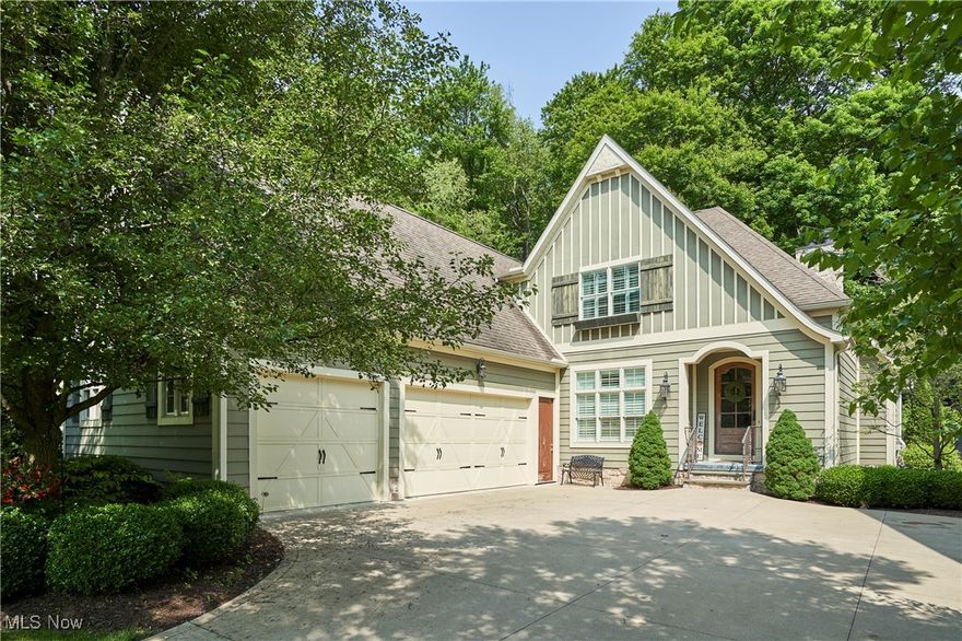 Welcome to Reserve at Waterford, a gated & maintenance-free community in Bath Twp. On one of the most private lots in this community, this home features magnificent craftsmanship throughout including herringbone wood floors, 12ft beamed ceilings, custom built-ins, arched doorways & raised paneling. Beamed great room with wood burning FP opens to gourmet kitchen with stainless appliances, Jenn-Air 6-burner range 10ft granite island & custom cabinets. A large butler's pantry with 2nd sink & dishwasher, beverage center & walk-in pantry is tucked behind kitchen. There is a formal DR overlooking the wooded rear yard. Oversized french doors lead to screened porch w/magnificent stone FP. A study off the foyer is accented with antique doors, hardwood flooring, large picture window, custom bookcases. Attached to a full bath, this could be optional 4th BR. The 1st floor master suite includes tray ceiling, lovely chandelier & elegant & spacious BA leading to huge walk-in closet. A large mud room w tiled floor ,a area with desk is located between kitchen & garage. Upstairs are 2 BR, each with its own vanity area w/shared tub & commode area. Off the upstairs hallway there is a built in desk, oversized closets & a stackable unit laundry. The private, fenced backyard off the screened porch offers large blue stone patio, stacked stone wall, lush landscaping, fenced rear yard. The home features newly finished basement with a  half bath , second laundry area, sitting room, another bedroom & large unfinished storage area, 2 laundry rooms, mudroom, & 3-car garage. First floor laundry hook up is located behind a white cabinet in the master bedroom closet.