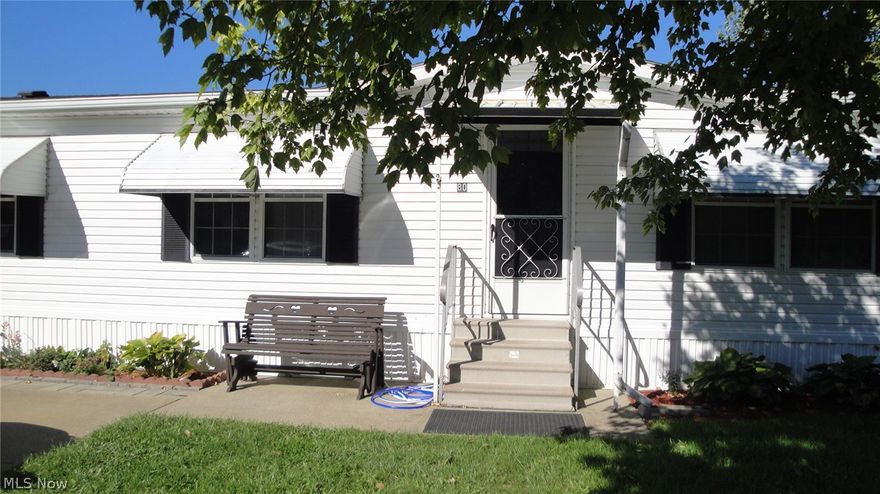 1992 Woodbridge 28x 46 with 3 bedrooms & 2 baths. 1144 sq. ft.Beautiful decorated with newer floors & roof. Nice shed with porch on back. Nice lot with field in back. Indian Village park. Owner moving out of area.