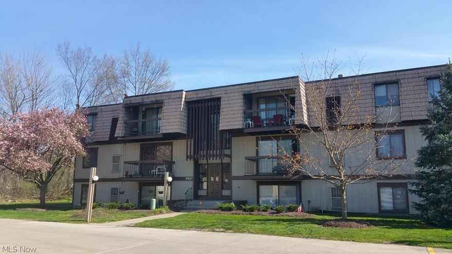 Very well maintained third floor unit with lots of natural light. Newer windows, laminate floor throughout the unit. Updated eat-in kitchen with newer cabinets, backslash and laminate floor. Laundry room of eat-in kitchen with washer and dryer which stay with the unit. Balcony of great room. Both bathrooms have been remodeled and have newer vanity, modern faucets and bath fixtures. The full bathroom has granite vanity and ceramic tiles on the wall surrounding the tub.The master bedroom has a half bath. all the closets doors and the rooms doors are new. The unit has it's own one car garage. In the development there is a tennis court/basketball court, in ground swimming pool, club house which can be rented for private parties, picnic tables and grills. The maintenance fee includes: water, sewer, snow removal, exterior building, landscaping, property management, association insurance.