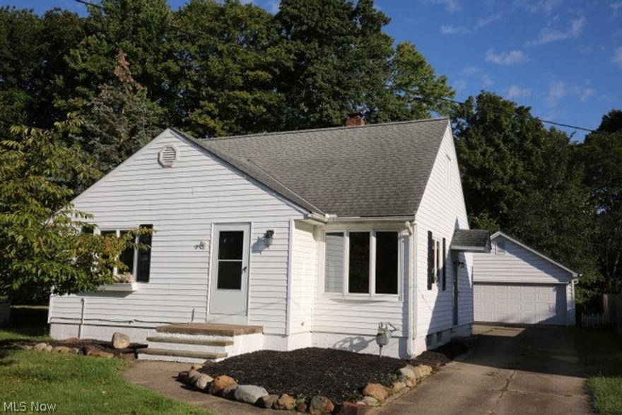 Large updated Cape Cod home in ideal location on a dead end street.  Freshly painted with new wood laminate floors and carpet throughout.  Great set up with a large dormer that adds 2 bedrooms and a full bathroom on the second floor.  Main level has a bedroom and full bathroom, large living room, dining room and updated kitchen with new white cabinets, Granite countertops and new stainless appliances.  Open dining room with glass slider to attached three season room.  Partially finished basement with built in bar and new tile floor.  New furnace, A/C and hot water tank.  1/2 acre lot on two parcels.  Additional parcel included and goes all the way back to Lindgerg.  Oversized 2 car garage and large shed.  This one will not last !!