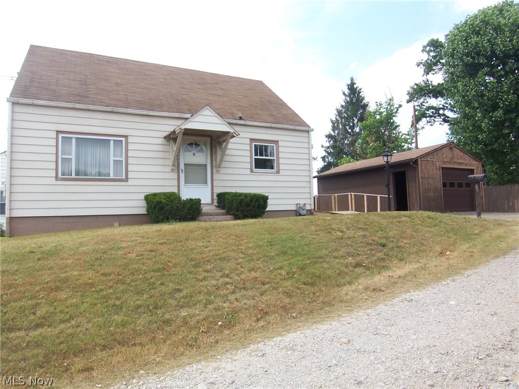 Nice two story, three bedrooms, one bath, home conveniently located on a corner lot. Dining room could be converted to a fourth bedroom. Home features beautiful Oak floors on the main level recently refinished, a partially finished basement with rec room, laundry and workshop. A one stall garage and storage shed.