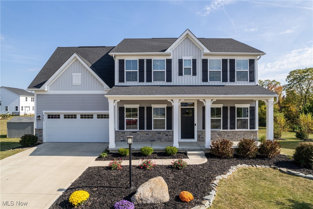 Tucked away on a cul-de-sac, this nearly new home combines modern design with thoughtful details. The exterior showcases timeless brick and vinyl siding, beautiful landscaping, and an inviting front porch. Step inside to find a bright, open floor plan filled with natural light. Just off the foyer, a flexible room makes the perfect office or additional living space. The kitchen is a showstopper, featuring a large center island with granite countertops, a subway tile backsplash, and a seamless flow to the dining area and living room, ideal for both entertaining and daily living. A sliding glass door off the dining area opens directly to a beautiful composite deck overlooking the backyard, while a convenient mudroom off the garage connects directly to the kitchen. Upstairs, you'll find four spacious bedrooms, including a stunning primary suite with two walk-in closets, and a luxurious bathroom with dual sinks and a dual-head shower. A second-floor laundry room and additional full bath complete this level. The finished walk-out basement expands your living space even further with a large rec area, full bathroom, and a dedicated storage room—offering plenty of room for entertaining, hobbies, and overnight guests. Outside, you'll love the direct access to the walking and biking trail and park located just behind the property. Residents also enjoy the benefits of being within the highly rated Medina City School District and no RITA tax. The community is situated across from the Medina Country Club and just minutes from shopping, dining, and local parks. This home has it all - style, convenience, and location. Schedule your private showing today!