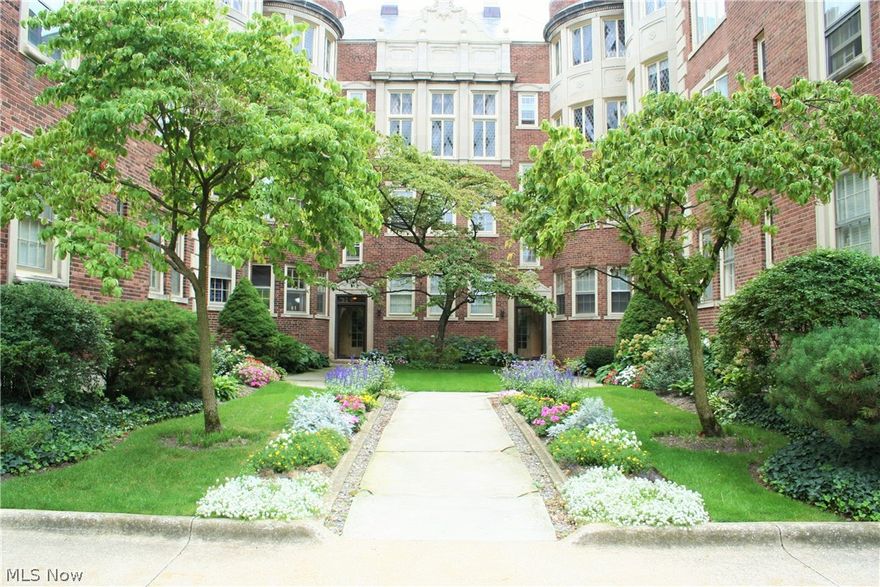 Come see this handsome 2 BR condo unit in Shaker Heights! Located on the second floor of an all brick building with a beautiful courtyard and attached garage with a dedicated parking space.  Hardwood floors throughout. Natural light floods through the large bay window into the cozy great room which features a fireplace.  The dining room is large enough to fit a 10 person table. The master bedroom has two closets and a large window overlooking the courtyard. The bathroom has classic subway tile and ceramic flooring. The unit has more than enough storage -- with a very large walk-in closet off the entrance and a dedicated storage unit in the basement of the building. Grocery store, library, city hall, Shaker Square all within walking distance. All these features in the desirable Shaker Heights School district for only $39,900!