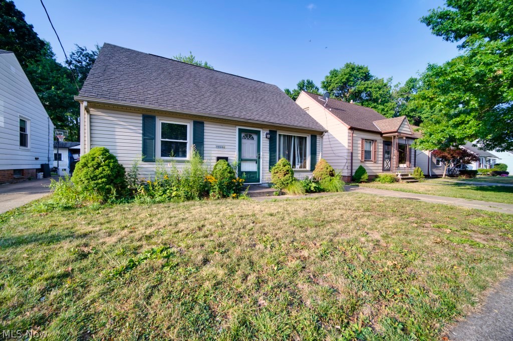 Great opportunity for this Three Bedroom, One Bathroom Bungalow located on a quiet Cleveland Street. Upon entering the home, you will be delighted by the flowing floor plan. The living room is nicely sized and leads to the eat in kitchen. This home offers easy one floor living with two bedrooms, the full bathroom and the laundry room completing the first floor. Head upstairs to find additional living space which can be used as a spacious primary suite, an office and sitting room or however best suits your needs. The backyard features a cozy sunroom. The detached 1 car garage provides plenty of storage. This property is waiting for its next owners to make their own with endless possibilities and opportunities. Great location with easy access to downtown Cleveland, highways, shopping and dining! Why rent when you can own! Easy to show! Schedule your appointment today!