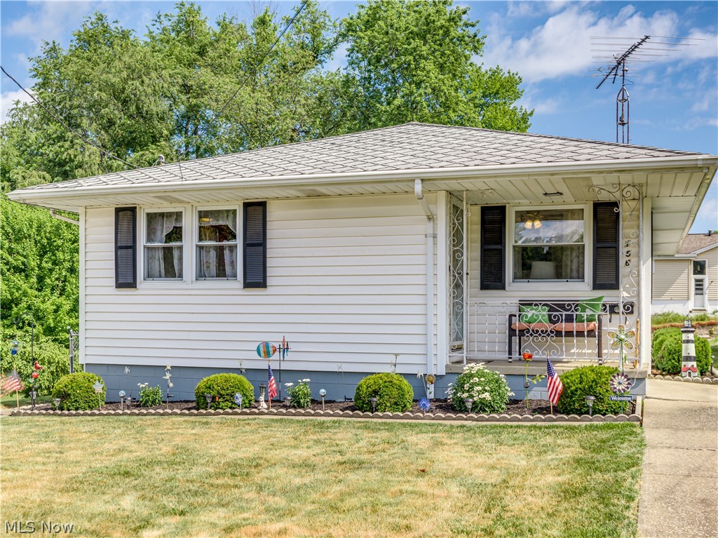 Adorable ranch home in 156 Lake Ave NE, Massillon. This lovely well-maintained home has so much to offer its potential new owner(s). Pull into the paved driveway conveniently located on Janice St & be greeted by a spacious two-car garage offering extra space for a workshop or garden items. You'll find a paved walkway & chain-link fence (for protection of your pets) leading to the cement patio & side door where you'll enter off of the eat-in kitchen (appliances included) which has been recently updated w/ granite countertops, laminate floor, & quality modern cabinetry. Next up is the generously sized living room featuring a large three-pane picture window and coat closet next to the front door. Both of the two bedrooms have hardwood floors and are comfortably sized w/ bypass door closets. Finishing off the 1st floor is the bathroom w/ a walk-in jetted bathtub that has a lifetime warranty. If that is not enough head downstairs to find a large rec room complete w/ a fully applianced kitc