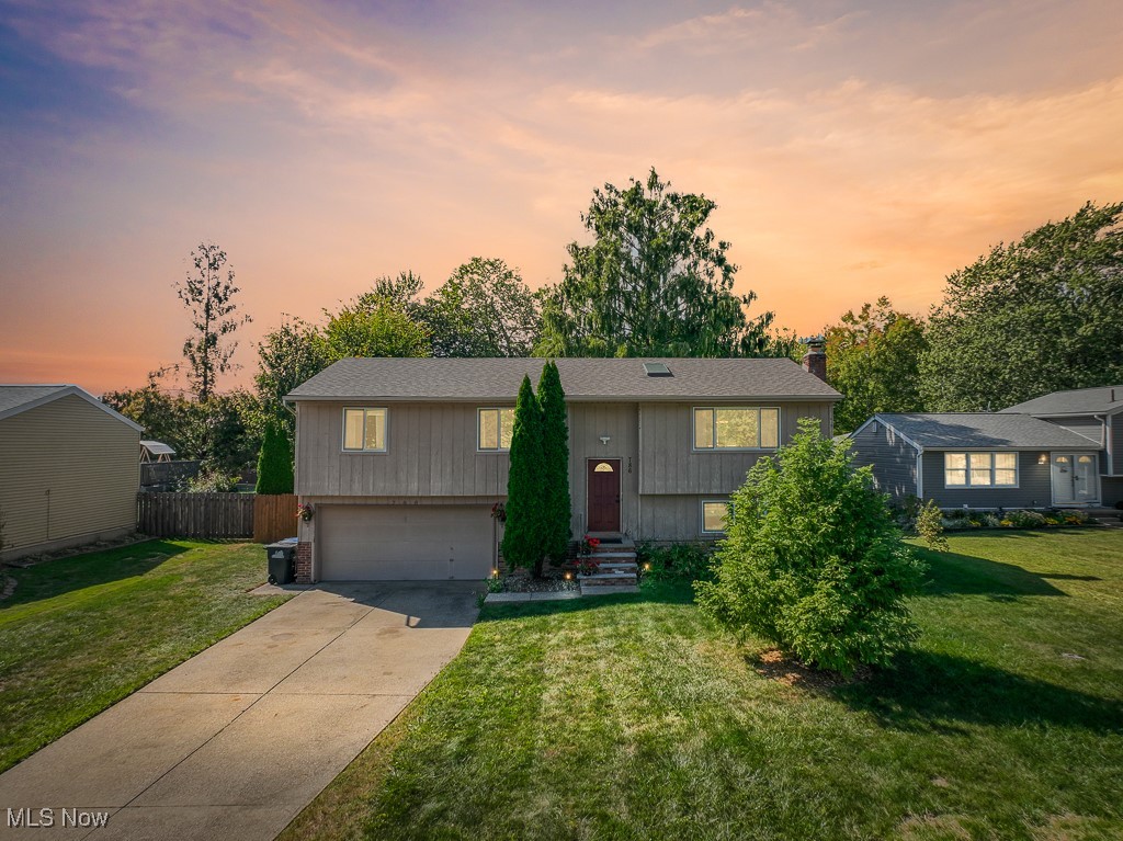 Welcome to this spacious 3 bedroom, 1.5 bath split-level located in the heart of Brunswick! This home features an open and inviting floor plan with hardwood floors and large windows that fill the living spaces with natural light. The living room showcases custom built-ins and connects seamlessly to the dining area and kitchen, creating the perfect flow for everyday living and entertaining.
The updated kitchen offers ample cabinet space, and easy access to the dining area. Upstairs, you’ll find generously sized bedrooms. Bathrooms have been tastefully updated for modern comfort.
The finished lower level includes a cozy fireplace and flexible living space—perfect for a family room, home office, or recreation area.
Outside, enjoy a large fenced-in backyard with mature landscaping, garden, a storage shed, and a covered patio for relaxing or entertaining.