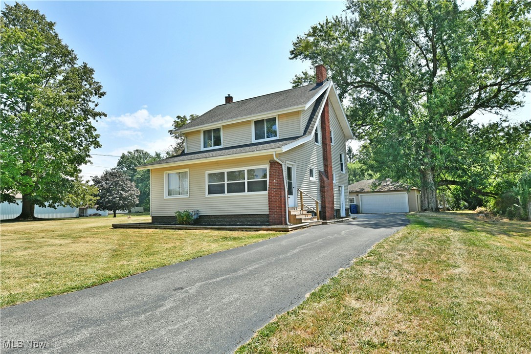 Charming and beautifully renovated home in Boardman School District on a large country like lot with convenient access to 680 and all the shopping and dining options Boardman has to offer. If you are in need of 4 bedrooms at a reasonable price and move in condition, this is a great option! The first floor has beautifully restored original hardwood floors and any home cooks ideal kitchen set up! Lots of new cabinetry and stone countertops, a stylish backsplash and stainless steel appliance package stays! A mud room area leads to the back yard.The large living room has a cozy tiled fireplace with built ins and newly added recessed lighting. A convenient half bath is located off a sitting room that could also be utilized as an office or playroom.The spacious dining room has charming built ins. There are new windows throughout the home and Central air was added in the last year and furnace and hot water tank updated in 2019. Updated electrical panel. Upstairs is a fully renovated main bath and 4 bedrooms.Hallway has a built in linen closet and a laundry chute for convenience and storage. Full basement and washer and dryer stay as well as a 2 car detached garage with extra storage. This home has character with all the modern upgrades you are looking for!