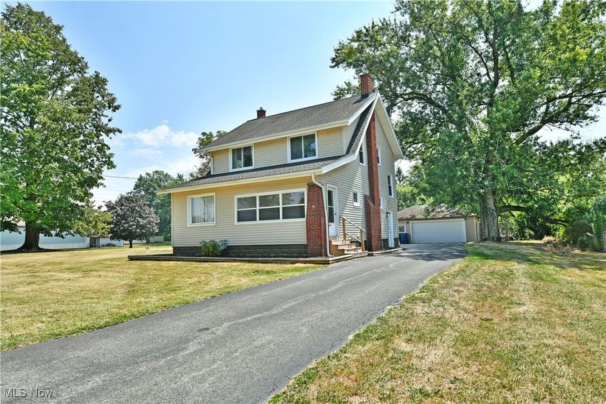 Charming and beautifully renovated home in Boardman School District on a large country like lot with convenient access to 680 and all the shopping and dining options Boardman has to offer. If you are in need of 4 bedrooms at a reasonable price and move in condition, this is a great option! The first floor has beautifully restored original hardwood floors and any home cooks ideal kitchen set up! Lots of new cabinetry and stone countertops, a stylish backsplash and stainless steel appliance package stays! A mud room area leads to the back yard.The large living room has a cozy tiled  fireplace with built ins and newly added recessed lighting. A convenient half bath is located off a sitting room that could also be utilized as an office or playroom.The spacious dining room has charming built ins. There are new windows throughout the home and Central air was added in the last year and furnace and hot water tank updated in 2019. Updated electrical panel. Upstairs is a fully renovated main bath and 4 bedrooms.Hallway has a built in linen closet and a laundry chute for convenience and storage.  Full basement and washer and dryer stay as well as a 2 car detached garage with extra storage. This home has character with all the modern upgrades you are looking for!