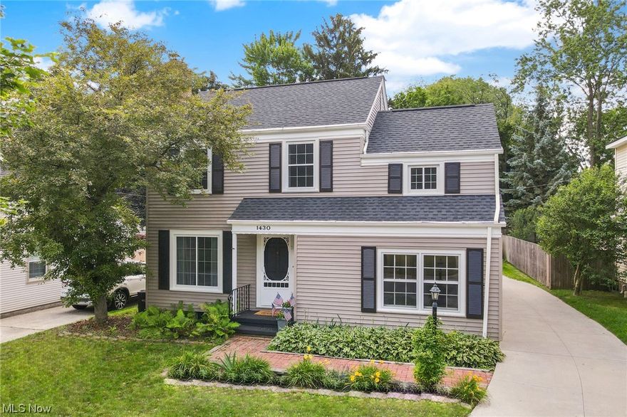 There's so much to love in this beautiful Colonial in the heart of Cuyahoga Falls! It’s warm and welcoming, filled with natural light and hardwood flooring throughout. Open flow between Kitchen, Dining Room, and Living Room, creates a feeling of connection – whether you’re hosting a party or preparing a meal for your family. Kitchen includes SS appliances and ample cabinetry and counter space for all your cooking projects. Family Room, with built-in wall storage, will be a favorite gathering space for family and friends. Bonus Room, just off the Kitchen, was most recently used as a Home Office. Encompassed by mature trees, the backyard feels private with large paver patio for relaxation and easy entertaining. There are three good-sized bedrooms upstairs – the 16 x 12 Primary Bedroom has two closets. Two-Car Garage offers abundant storage for vehicles, equipment and toys. Updates include newly remodeled Bathroom (2023), newer Amana washer and dryer (2023), roof (2016), windows replaced