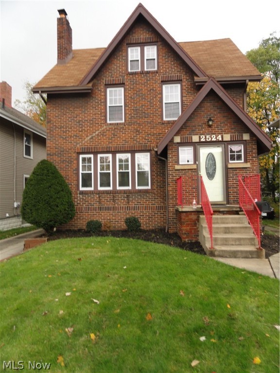 Brick Colonial in desirable location within close proximity to the Fitness Center and the new Front St Promenade offering shops, restaurants, concerts and festivals. This charming home features a spacious formal living and dining room with natural wood trim and a built in cabinet. Potential for 5 bedrooms with 3 bedrooms on the second floor, a spacious third floor with a closet, and a lower level rec room or 5th bedroom with a fire escape window and a full bath. This home has been well maintained. It has the preferable hot water radiant heat with a new boiler in 2007. It also has central air with two units to accommodate the whole house including third floor. 2 car detached garage. Priced to sell!