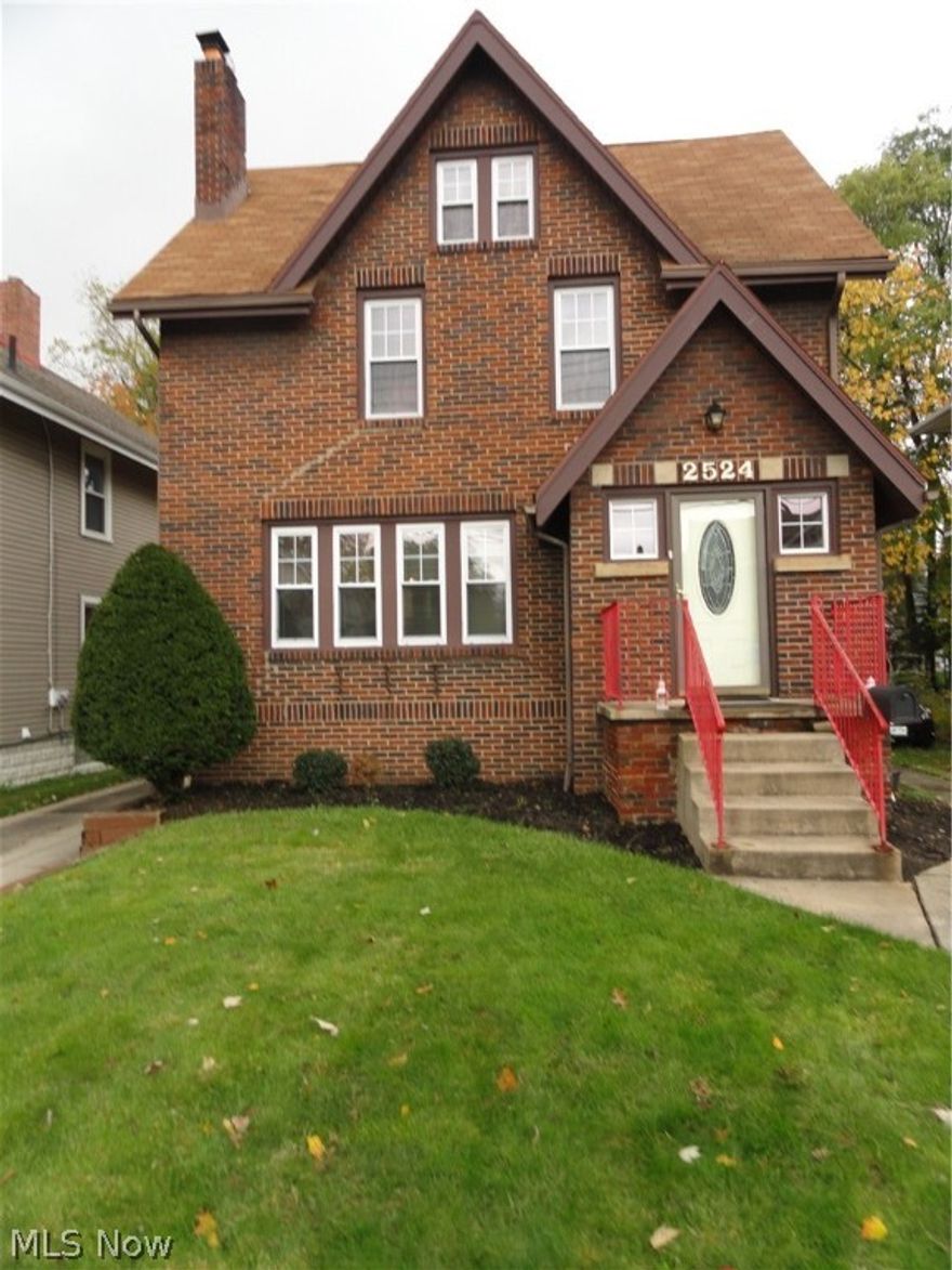 Brick Colonial in desirable location within close proximity to the Fitness Center and the new Front St Promenade offering shops, restaurants, concerts and festivals. This charming home features a spacious formal living and dining room with natural wood trim and a  built in cabinet. Potential for 5 bedrooms with 3 bedrooms on the second floor, a spacious third floor with a closet, and a lower level rec room or 5th bedroom with a fire escape window and a full bath. This home has been well maintained. It has the preferable  hot water radiant heat with a new boiler in 2007. It also has central air with two units to accommodate the whole house including third floor. 2 car detached garage. Priced to sell!