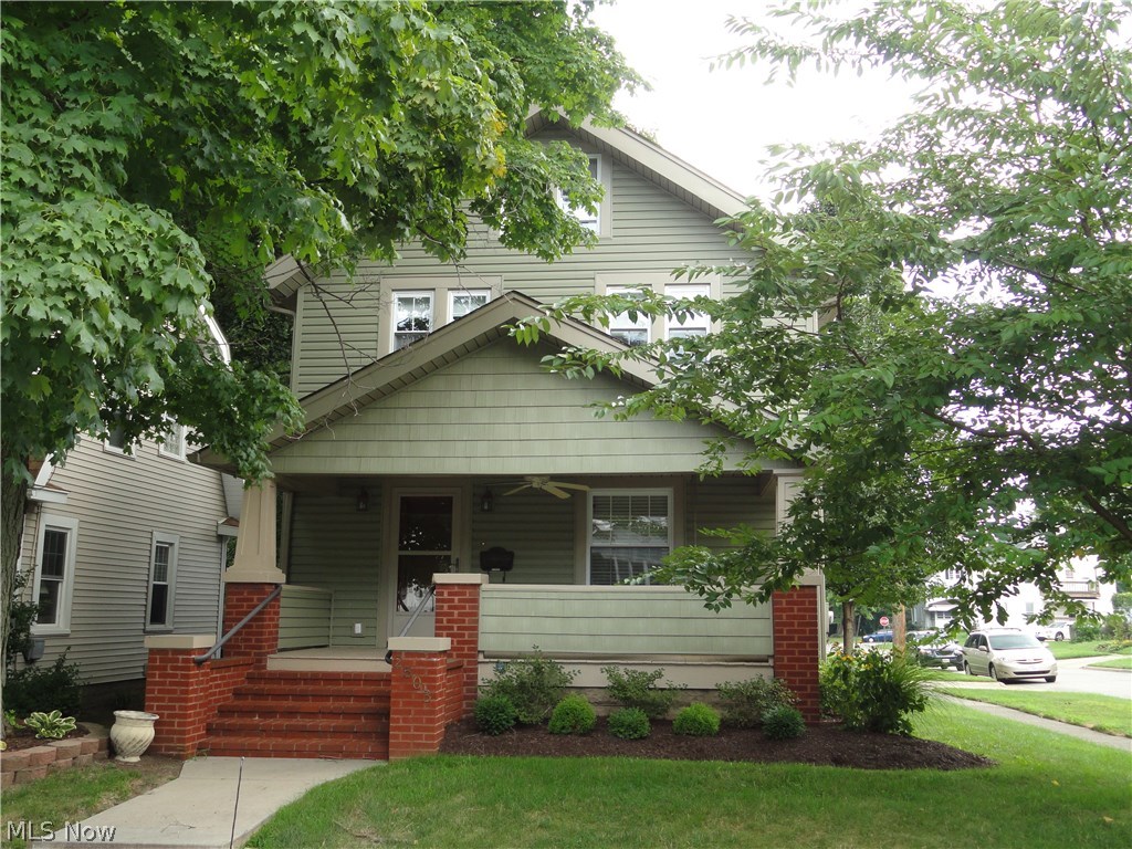 Charming Classic Colonial with many impressive features. Sharp curb appeal with shake shingle vinyl siding, neatly manicured lawn and flower beds plus a welcoming front porch with swing! Spacious formal living and dining room has wood floors, window seat and French doors. Lovely kitchen with maple cabinets, updated appliances and hardwood floor. 3 spacious bedrooms on 2nd floor plus finished third floor too! The expanded master bedroom offers double closets, windows across the back plus an exit with private balcony. The guest bathroom is updated with double sinks and vanity, single piece tub insert and wood floor. Lower level has professionally finished rec room and 2nd full bath! Step out the back yard to private patio and separate fenced yard. New dishwasher & disposal. Updated windows, light fixtures and storm doors too.