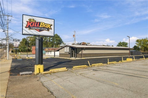 Photo of 1305 E Tallmadge Avenue, Akron, OH 44310 (MLS # 5255315)