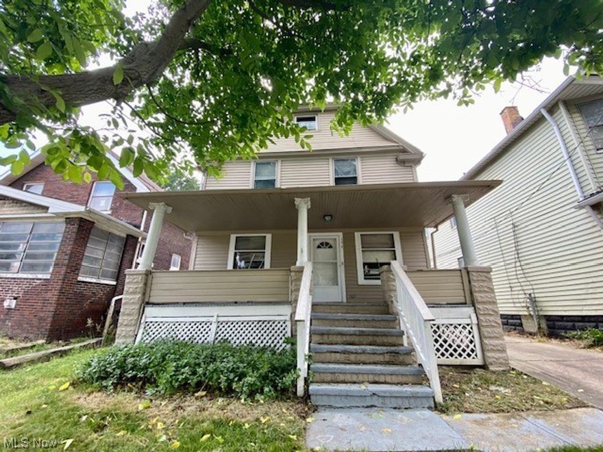 Historic colonial home located in Slavic Village, near Newburgh Heights offers an in law suite with separate entrance. It can be isolated from
the main area or combined with it for flexibility. It has a separate bedroom, full bath and a great room with kitchen and living space. This
home boasts classic wood work in the first floor public rooms including the entrance way, staircase, living and dining room. It has a large
kitchen.  There is a half bath on the first floor. There are two additional bedroom and a bath on the second floor. The third floor also has a bedroom. There is a large 2 car garage with space for a work area. Located on a tree lined cul de sac. The home is near the Washington Reservation/Park which features a 9 hole golf course designed by IMG. It is also near the Warsaw Park which offers a swimming pool, tennis courts, basketball courts and playground. Additionally has lead safe certificate.