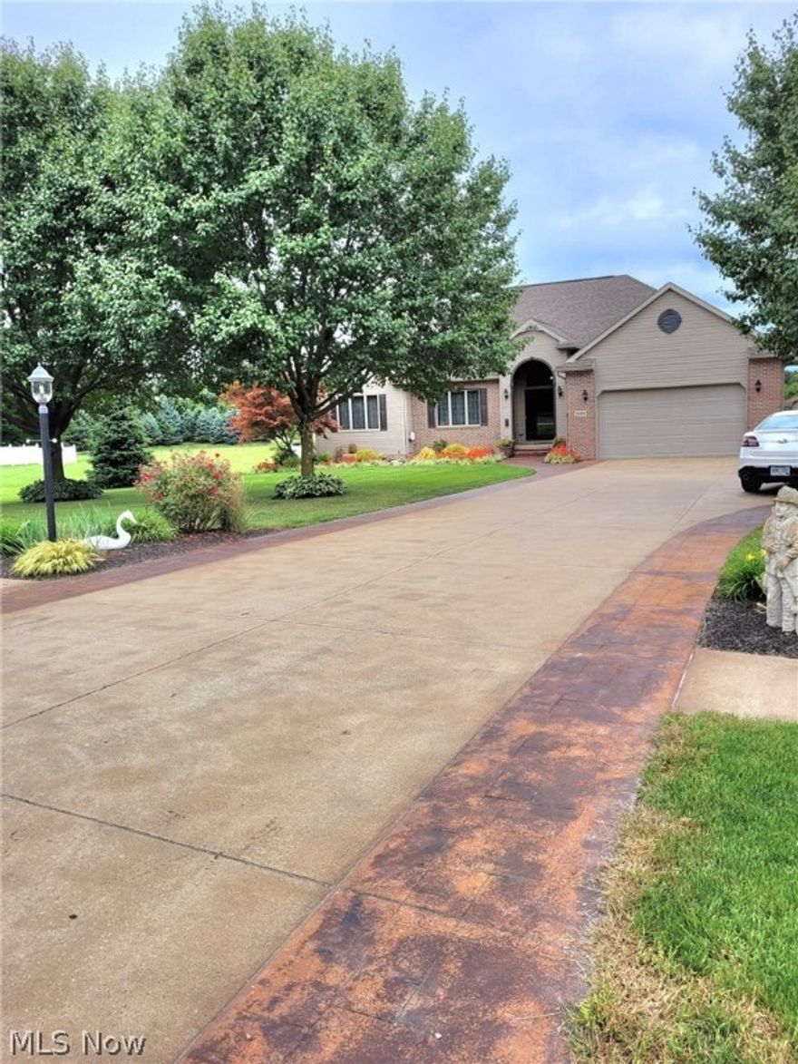 From first glance, you will be smitten by the fabulous curb appeal with this contemporary ranch with its sweeping driveway, brick accents, impressive roof lines, half round windows & best of all 1 attached 2 car garage w-hot/cold water and a 2nd detached garage that is heated with 1/2 Bath. The inviting front door beckons you to step inside the spacious foyer, which opens to the oversized great room, w/ 9 foot tray ceiling lined with crown molding, leaded glass windows & 6 panel solid oak doors throughout. Beautiful French doors that showcase the versatile formal dining room or could be used as an office. The laundry room is also on the main floor for easy access. Master Bedroom has a master bath which has been completely remodeled and walk-in closet. The 3rd bedroom has a walk-in closet and half bath which is great for in-laws/guest. The kitchen has an abundance of rich cabinetry and loads of granite countertop space and ceramic floors. Also a handy island and large breakfast bar also with granite counter tops. The patio door overlooks the concrete/stamped patio and the large pool with a deck/gazebo. A bonus flower garden with privacy fence/brick patio ready for spring. Also includes a 12x20 outbuilding for lawn tools/accessories. Situated on 1.6 acres in Firelands School District, this beauty is a rare find.