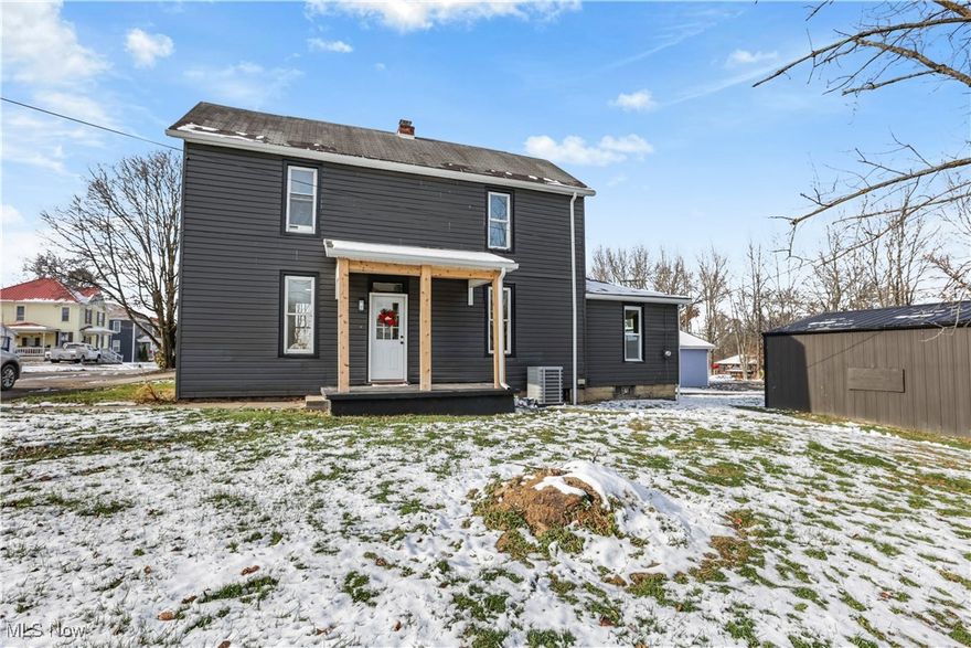 New Listing in Byesville, Ohio!  Rolling Hills Local School District. This stunning 2-bedroom, 1-bathroom home has been completely remodeled from the studs up with a modern, open-concept design. The spacious kitchen features beautiful cathedral ceilings that add to the home's airy, elevated feel. Sandy oak flooring throughout, creating a warm, inviting atmosphere. Every detail has been updated, including brand new electrical, insulation, drywall, and flooring. The bathroom is highlighted by a gorgeous tile shower, and the home also features all-new interior doors. With a brand-new AC system and hot water tank, this home is move-in ready. The second-story laundry adds convenience, and the detached garage provides additional storage. Located on a corner lot, this home offers extra privacy and outdoor space. The seller, *a licensed agent in the state of Ohio*, will also pay for a new window in the garage and new exterior doors in the basement. Don’t miss the opportunity to own this beautifully updated home in Byesville!