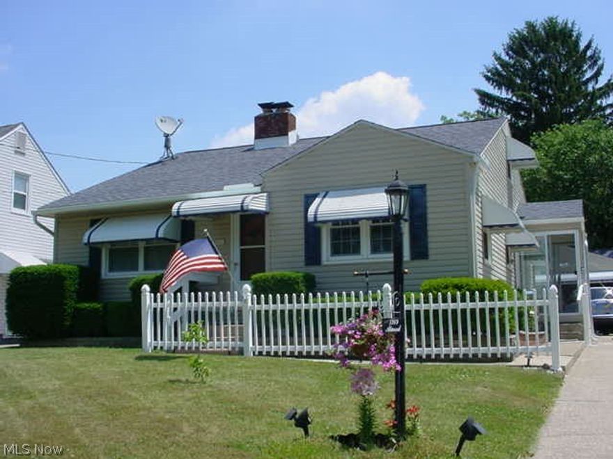 Shows well is an understatement! Remodeled kitchen w/ceramic tile! Living room w/newer wood laminate! Master w/slider to rear deck w/retractable awning! Fenced back yard w/storage shed! 2+ detached garage! Partially finished basement w/wood burning fireplace, full bath and 2nd kitchen! Updates - 1989 blown insulation, 2003 glass block, 2004 8x10 shed & new garage door, 2007 windows, roof, gutters, siding & awnings, 2009 furnace, AC & HW tank! All appliances!