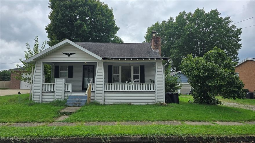 Check out this FOUR bedroom home with main level living, detached double garage, and pool house!  Situated conveniently on 46th Street in Vienna, you'll appreciate the hardwood floors, large kitchen with island, and laundry on the main level.  Two bedrooms, two living spaces, and a full bath round out the first level.  Upstairs, a loft with half bath and two bedrooms fill the space.  The flat lot includes an in-ground pool with it's own air-conditioned pool house (with a third bathroom!), and ample off street parking as well as a two car garage.  Priced below appraisal, this home is ready for immediate occupancy by it's new owner(s)!