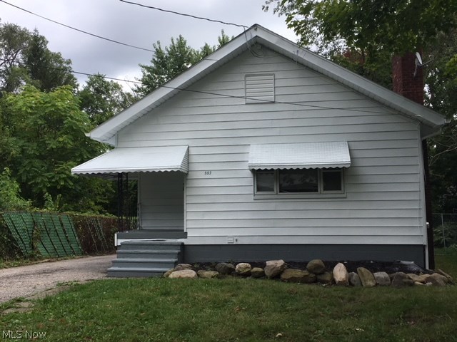Move right in to this south east Akron home! Move in ready, with a freshly painted exterior, updated kitchen and bathroom, vinyl windows, updated lighting and new gutters. Carpet is about 2 years old, hot water tank 5 years, back half of the roof is newer, updated electrical and vented glass block windows in the basement. Very spacious living area with an open floor plan. Easy to show. Call to take a look today!