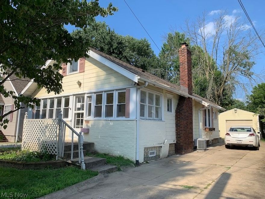 Great potential in this quaint Ranch style Ellet home!!! Fireplace in living room and open to formal dining room!!! Large enclosed front porch and basement; possible 3rd bedroom/additional living space in walk-up attic area!!! This property is eligible under Freddie Mac First Look Initiative through 9.11.19.