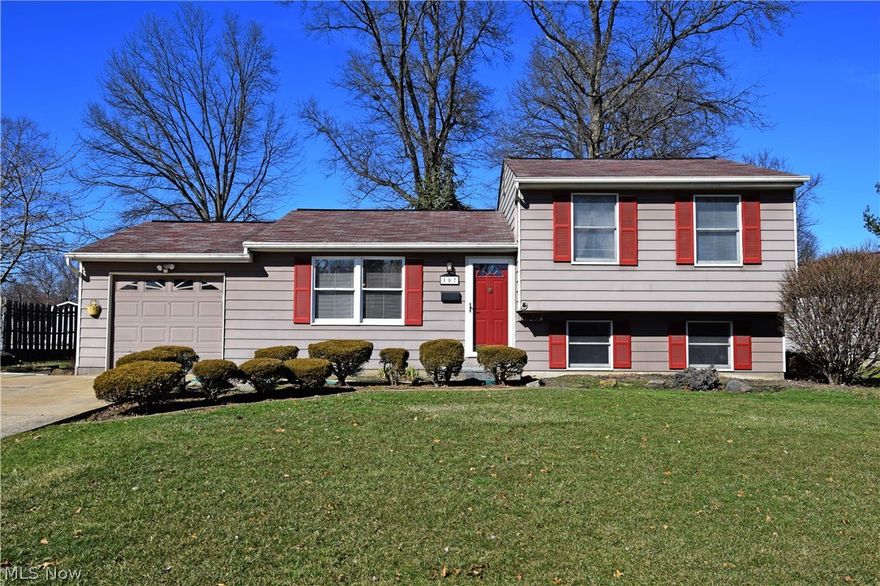 Don’t miss out! Get into this beautiful split-level home before it’s gone! This three-bedroom residence is just what your family is looking for. Great looks inside and out, a large carpeted living room, and an expansive, wood filled kitchen and dining area. Dark hardwood flooring with matching cabinets compliment the natural brick backsplash while a pair of French doors lead to the expansive brick and wood rear patio and gazebo area. Three robust upstairs bedrooms each offer carpeted flooring and bright colors. A full bath splits the rooms with updated shower, vanity and commode. The lower level offers a relaxing great room area along with nearby laundry services and additional storage and access to the attached single car garage.