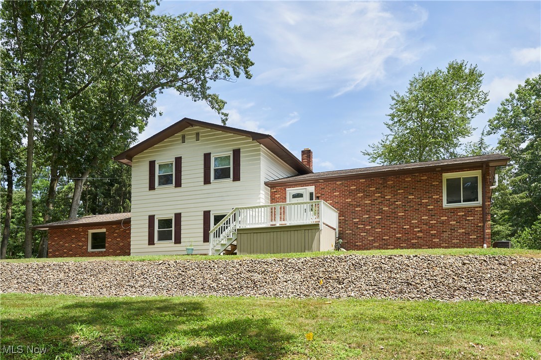 Welcome to this beautifully updated 4-bedroom, 3-bath split-level home in the highly sought-after Green Local School District. This home offers the perfect blend of modern style and functional living across a spacious, well-maintained layout. The bright and inviting main level features a stylishly renovated kitchen with stone countertops, a classic subway tile backsplash, and new stainless steel appliances — perfect for both everyday living and entertaining. Upstairs, you’ll find generously sized bedrooms and updated bathrooms. The lower level provides additional flexible living space ideal for a media room, guest suite, or home office. With three full bathrooms, there’s plenty of space and privacy for everyone. Step outside to enjoy a large back deck and patio, perfect for grilling, relaxing, or hosting friends. The large backyard is perfect for a variety of activities or peaceful evenings under the stars. The home is nestled in a quiet and private neighborhood, providing a serene setting while remaining close to parks, schools, and local amenities. Extensive mechanical updates provide peace of mind for years to come. The basement was professionally waterproofed in 2023 and includes a transferable warranty. All windows and sliding doors were replaced in 2020 and come with a lifetime transferable warranty. Gutters and downspouts were replaced in 2021, also with a lifetime transferable warranty. The boiler was replaced in December 2024, and the hot water tank is approximately five years old. A Culligan water filtration system was installed in 2021, along with a new electrical panel and glass block windows in the basement. This thoughtfully maintained home is truly move-in ready with quality updates throughout. A wonderful opportunity in a desirable location.