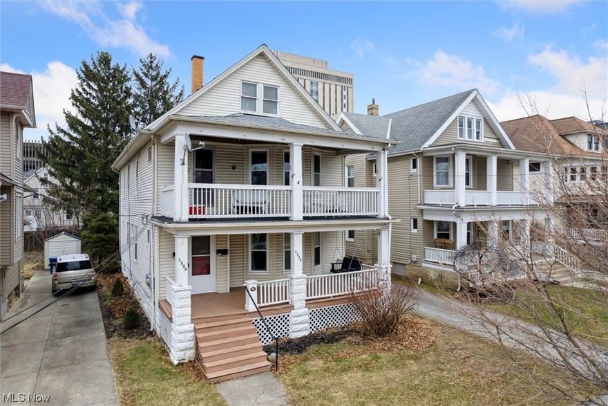 Great opportunity to own this two-family home located in the heart of downtown Lakewood, close to many local restaurants and shopping! Each unit offers a large front-covered porch and a balcony overlooking the rear yard. Spacious and bright living room with decorative fireplace, bay window, hardwood floor, and leaded glass windows. Formal dining room perfect place for entertaining. Two nice size bedrooms, a full bath, and a kitchen; appliances included. The third floor is an open canvas for lots of possibilities. Detached two-car garage. Recent updates include a new roof, a new garage 2018, first-floor unit bathroom remodel in 2019, new windows, second-floor kitchen, and bathroom remodel 2021