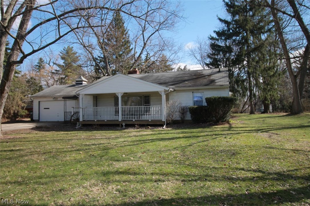 Looking for a three bedroom, two and a half bath Ranch Home? Look no further, we have the perfect home for you. Family Room has gorgeous cherry wood as you enter with a beautiful refaced wood burning fireplace completed in 2000; with the old brick underneath, and a new flu damper. Spacious eat in kitchen with electric cooktop, double wall ovens, plenty of counter space and storage space for all your kitchen essentials. In 2001, the owners completed a rear addition with a beautiful master suite, full bath, expansive jetted tub for your relaxation needs and a large walk in closet. There is also an extra room for an office or what ever your needs require. Most windows have been replaced in 2000 as well as whole house rewire. Window A/C units; radiant boiler heat, boiler replaced in 2009. Nice big lot, attached garage with half bath, and front porch to enjoy. Seller will also consider a rent to own.