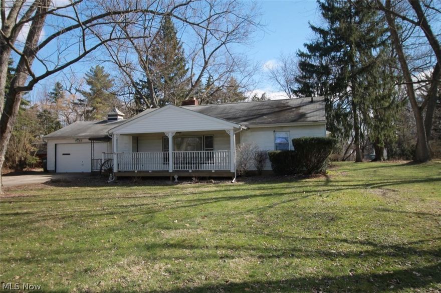 Looking for a three bedroom, two and a half bath Ranch Home? Look no further, we have the perfect home for you.  Family Room has gorgeous cherry wood as you enter with a beautiful refaced wood burning fireplace completed in 2000; with the old brick underneath, and a new flu damper.  Spacious eat in kitchen with electric cooktop, double wall ovens, plenty of counter space and storage space for all your kitchen essentials. In 2001, the owners completed a rear addition with a beautiful master suite, full bath, expansive jetted tub for your relaxation needs and a large walk in closet. There is also an extra room for an office or what ever your needs require.  Most windows have been replaced in 2000 as well as whole house rewire.  Window A/C units; radiant boiler heat, boiler replaced in 2009.  Nice big lot, attached garage with half bath, and front porch to enjoy. Seller will also consider a rent to own.