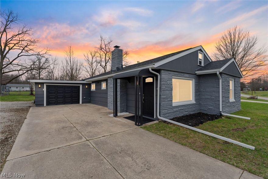 Exquisite remodeled ranch offering refined one level living on nearly ½ acre with exceptional privacy and premium upgrades throughout. This beautifully updated 3 bed, 1.5 bath home spans two parcels with no front or rear neighbors, ideally positioned on Sumner St across from the Northcoast Inland Trail, with the property extending all the way to Grafton St for a rare sense of openness and seclusion.

Every major improvement has been thoughtfully completed, creating a true turnkey experience. Enjoy a brand new Carrier HVAC system, new windows, architectural shingle roof, new hot water heater, and a new garage door with modern opener all selected for quality, longevity, and peace of mind.

The designer kitchen serves as the heart of the home, showcasing new Samsung appliances, a large island, coffee bar, soft close cabinetry, and granite countertops, seamlessly connecting to the dining area for effortless entertaining. A bright, airy sunroom brings in abundant natural light, while a dedicated laundry and storage room adds everyday convenience.

The primary bedroom includes a private half bath, and all bedrooms feature ceiling fans for year round comfort. The living room is anchored by a beautifully limewashed fireplace with a custom wooden mantel, adding warmth, character, and a touch of modern sophistication.

With its high end finishes, thoughtful updates, and unmatched privacy, this home offers elevated single level living in a serene Oberlin setting.