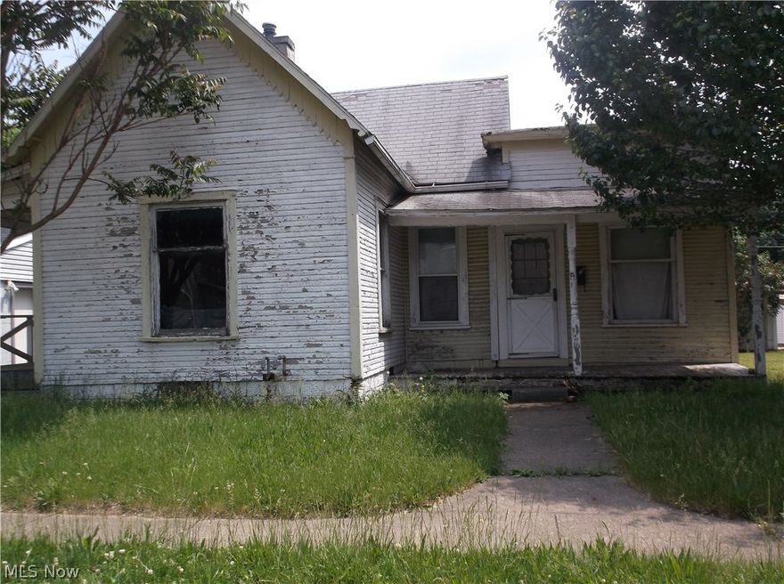 This house has been gutted and needs to be totally remodeled. Use caution when viewing the property- being sold "as in its present condition."