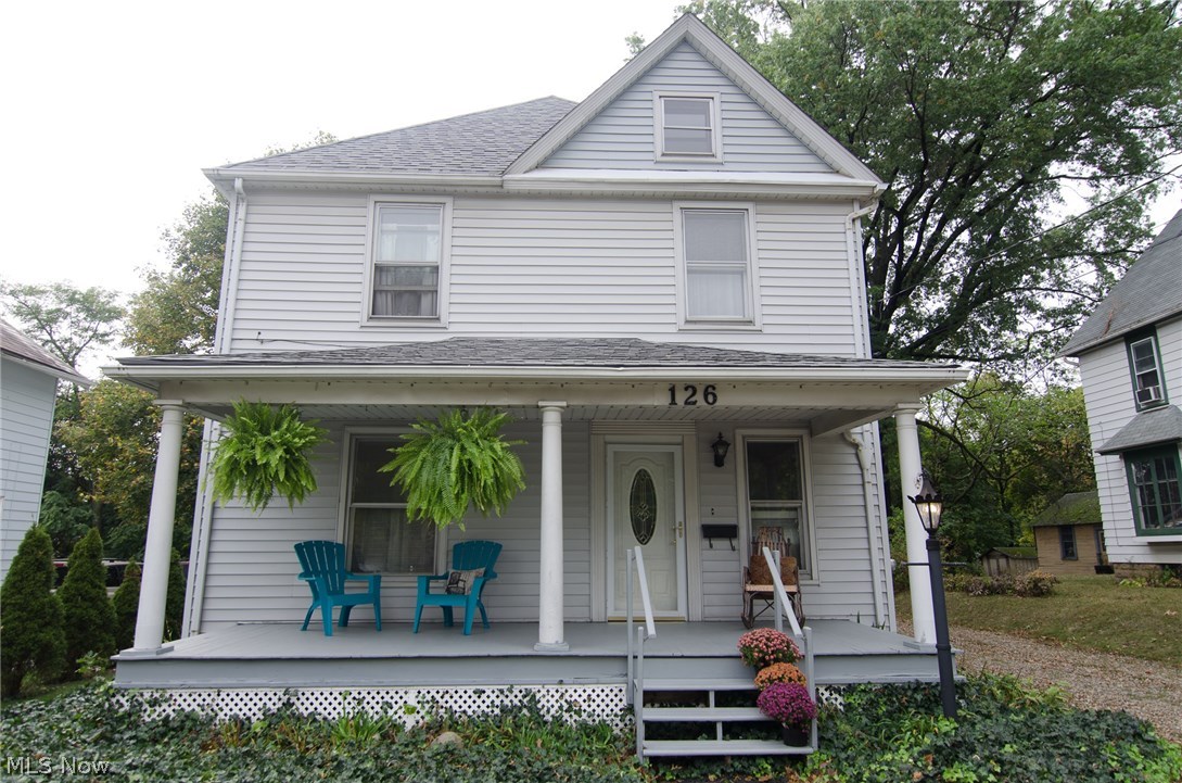 Absolutely charming colonial in the heart of Wadsworth! From the hardwood floors with inlays, to base boards and archways, you will fall in love with all of the stunning original woodwork throughout this home. Walk into the giant foyer, which would make a beautiful formal sitting or reading room. The open living room flows right into the formal dining room then to the large kitchen. The kitchen has lots of updates (2010) including tile floors, newer cabinets and counter tops, but has kept some of the original cabinetry that make this room unique and beautiful. The range and dishwasher stay and the fridge and microwave are negotiable. Up the lovely dark wood stairs to the 4 bedrooms and bathroom. You will be amazed at the space on this floor. A huge open center area will keep the family from running into each other! There are 4 nice sized bedrooms, one with rustic brick of the exposed chimney. In the bathroom there is a new vanity top & faucet, tile floor & updated lighting.