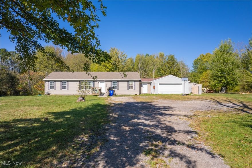 Discover this spacious Ranch home offering 2,311 sq. ft. of finished living space on a beautiful 2.91-acre wooded corner lot in Rootstown School District. Originally a 4-bedroom, 2 full bath home, a thoughtfully designed 2023 addition expanded the home with 2 more rooms, a large family room with sliding doors to the fenced-in backyard, and a full 8.5-course high gravel basement (ready to be finished to your liking) giving you a total of 6 bedrooms and 2 full baths! Inside, the kitchen comes complete with a refrigerator, stove, and dishwasher, and flows right into a dedicated dining area that’s perfect for family dinners or entertaining friends. Updates give peace of mind and this home features a new roof (2023), new furnace (2023) and a new septic system (2020). Step outside and you’ll find the start of your very own homestead — an above-ground pool (just waiting for a good cleaning and TLC to be summer-ready), a chicken coop and duck coop to start your backyard flock, and a fire pit area perfect for evenings under the stars. The land is open and inviting, offering plenty of space for gardens, animals, or simply enjoying the outdoors. A 2-car garage adds convenience. With modern updates, endless space, and country-living amenities, this Rootstown property is more than a house — it’s a lifestyle.