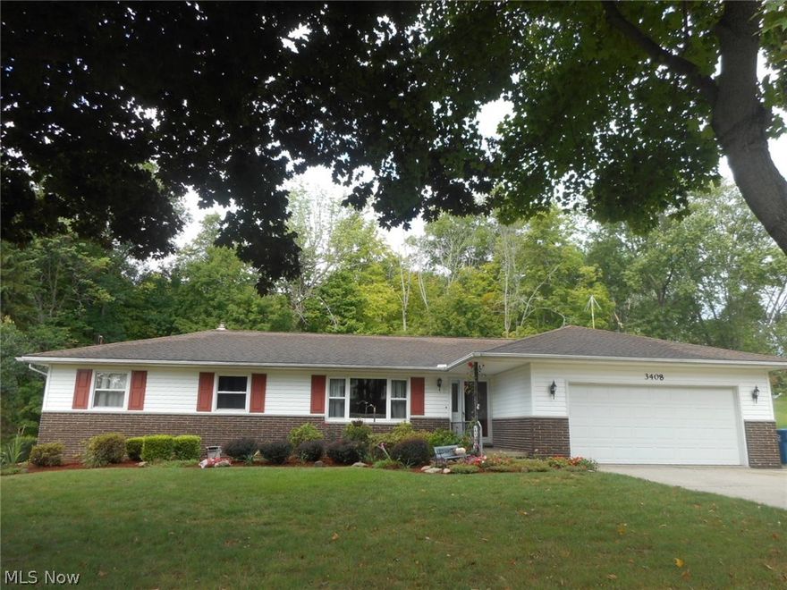 Awesome ranch with many updates. Brick and vinyl exterior. Covered front porch welcomes guests into this lovely home. Foyer with tiled floor. Living room with large picture window, newer carpet and neutral paints - opens into formal dining room with newer laminate floors, updated light fixture and another large picture overlooking backyard. Kitchen has been updated with cathedral oak cabinets, white tiled backsplash and tiled floors leads into the family room. The family room has a full wall brick fireplace with gas logs and a heart to sit by the fire on cold winter nights. Door that leads from the family room to a spacious deck with composite flooring and vinyl railing. The half bath is located off the family room with updated vinyl flooring. The basement is partially finished. Updates include - security block windows, water softener, carpet, paint, flooring. Roof was a tear off in approximately 2010. Oversized 2 car garage.