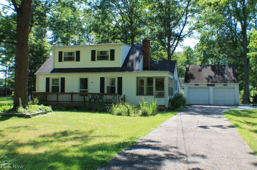 Unique opportunity to own this home in Aurora schools! 4 bedroom/1 bath bungalow style home on 2.15 acres! 2 bedrooms located on the first floor and 2 bedrooms on the upper level. Screened in porch area is a great place to relax and enjoy the wooded views! 2 car detached garage with storage above and a large shed. Access to Geauga Lake for fishing & swimming with membership!  Great opportunity to be near a neighborhood that includes parks but tucked away at the end of the street with ultimate privacy!