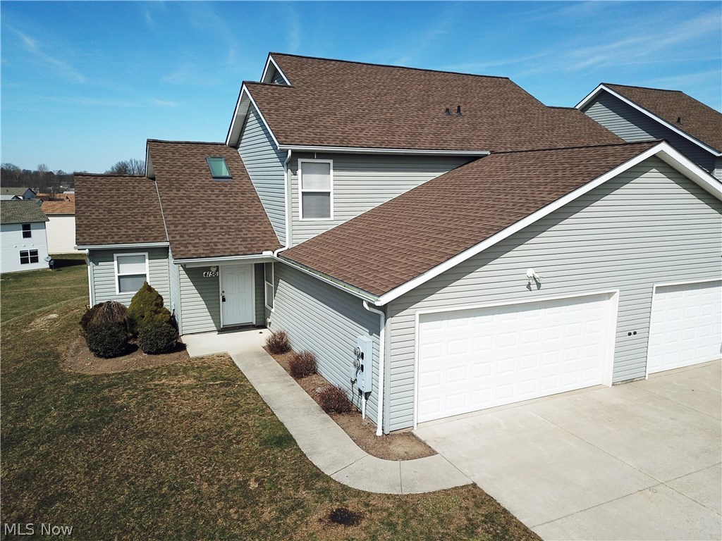 WOW! Look at this one! 3 bedroom & 2 full bath condo in Rootstown with 2 car attached garage! Why rent when you can own? Vaulted ceiling in the great room with an open concept to the kitchen and open staircase up to the second floor. 2 bedrooms upstairs with a Jack-n-Jill bathroom between. First floor bedroom with another full bathroom right across the hallway from the bedroom. First floor laundry, spacious fully applianced kitchen, concrete patio with great spacious views in the backyard. Don't wait until this is sold! Call today to schedule your​​‌​​​​‌​‌​​​‌‌​​​‌‌‌​​‌​​‌‌​​​​ showing!